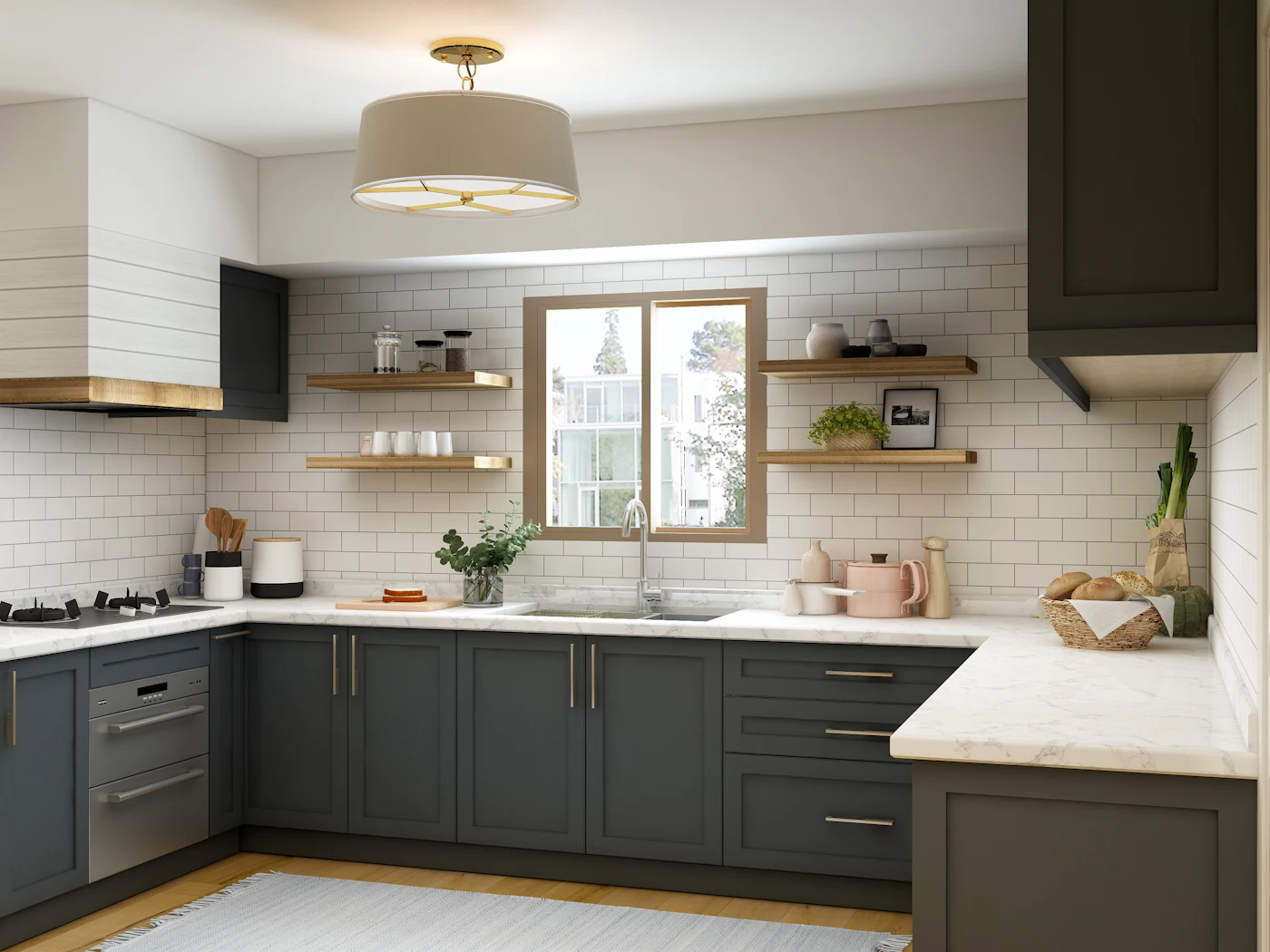 Galley kitchen in dark cabinets with a window over the sink